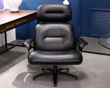 Roche Bobois Athea Swivel Chair and Ottoman