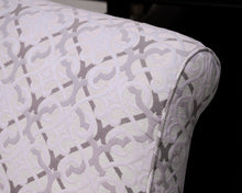 Upholstered Settee with Rolled Arms and Turned Legs