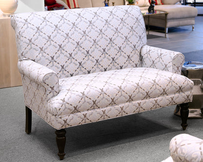 Upholstered Settee with Rolled Arms and Turned Legs