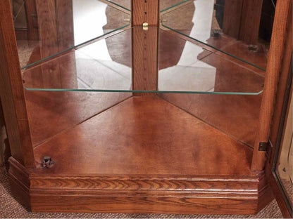 Howard Miller Oak Corner Display Curio Cabinet