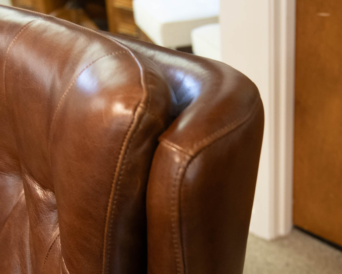 Pottery Barn Wells Tufted Swivel Recliner in Molasses Leather