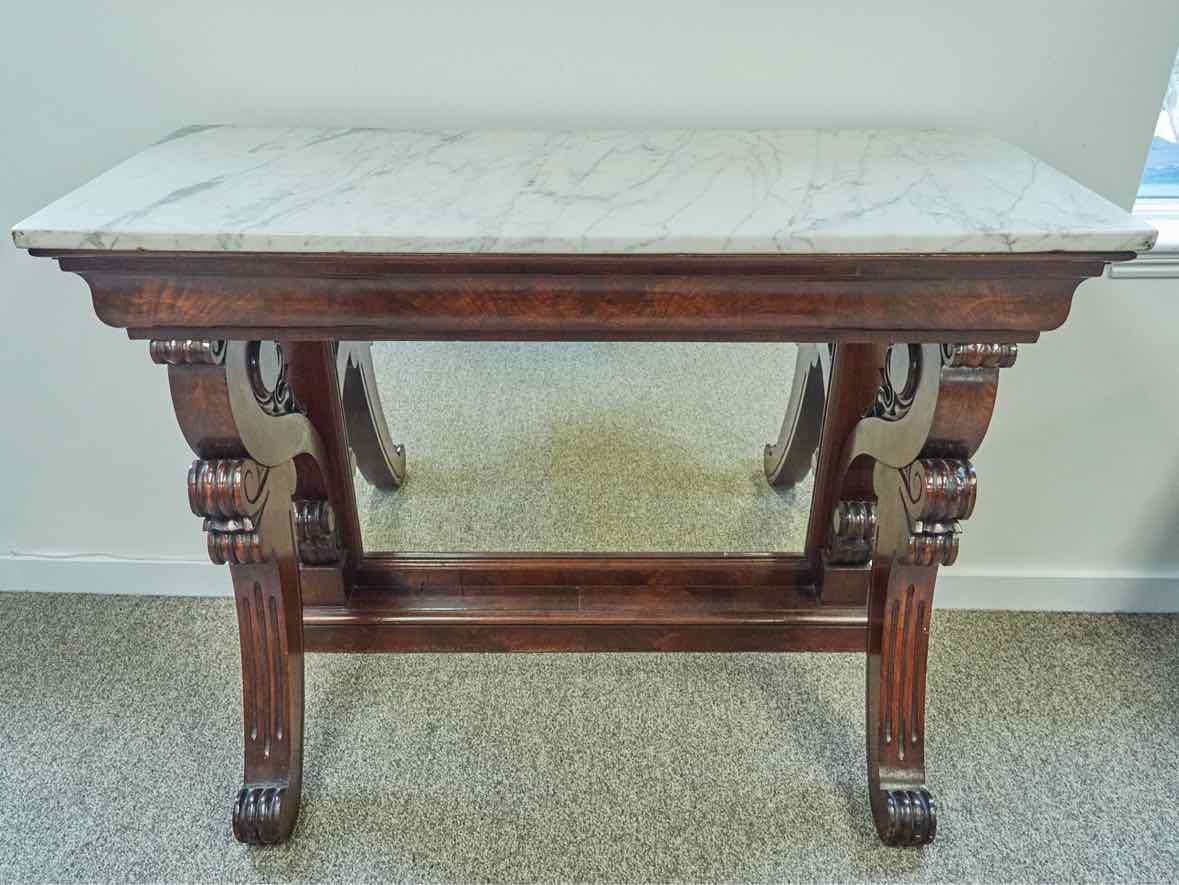 Carved Mahogany Console with White Marble Top and Mirrored Back