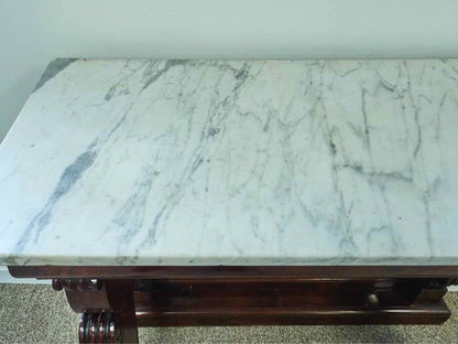 Carved Mahogany Console with White Marble Top and Mirrored Back