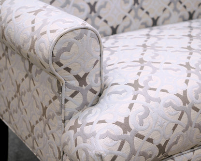 Upholstered Settee with Rolled Arms and Turned Legs