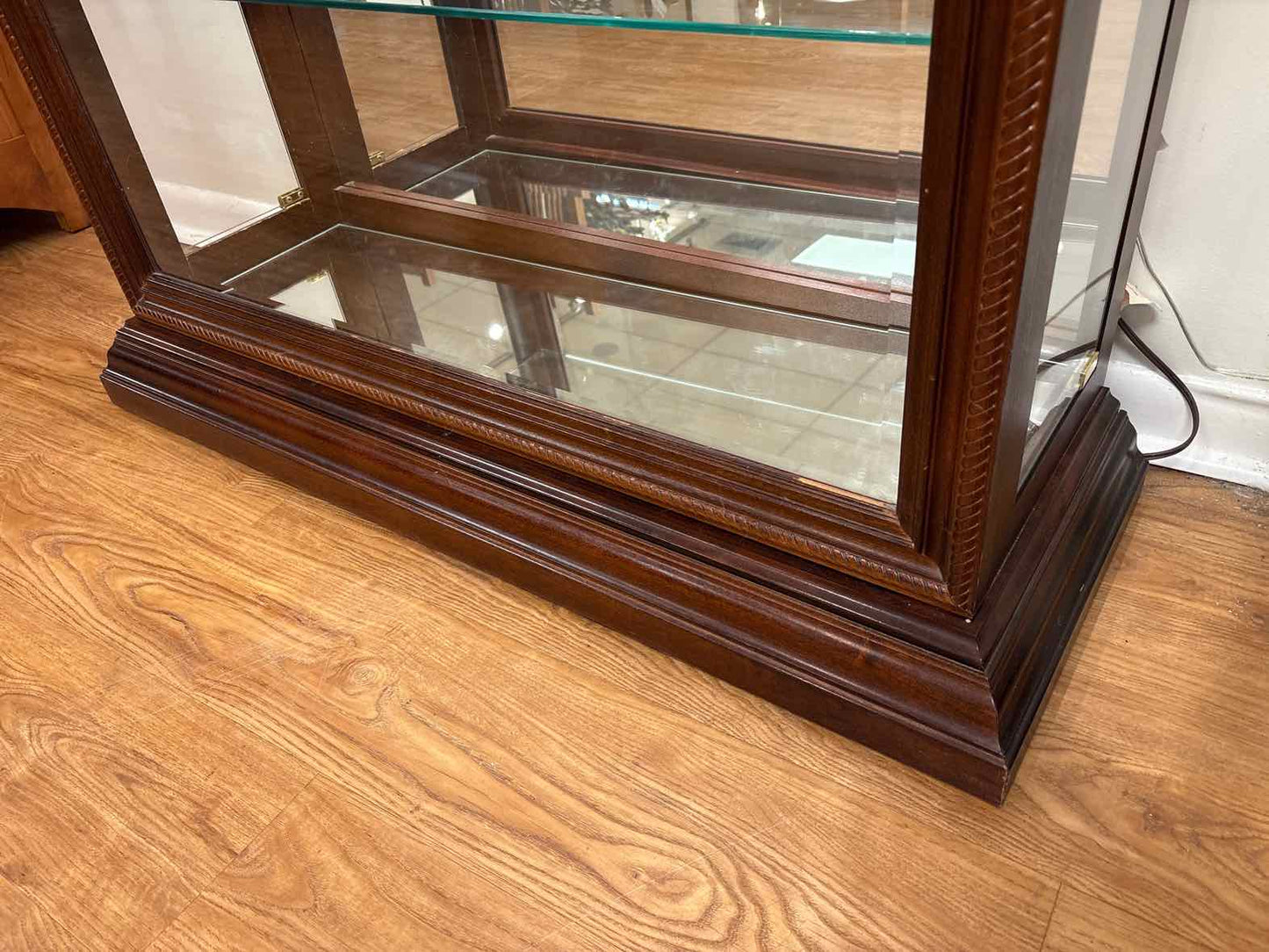 Pulaski Lighted Side Entry Curio Cabinet in Cherry