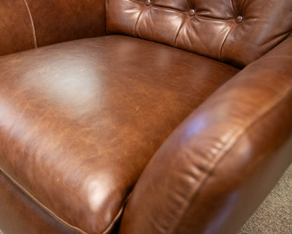 Pottery Barn Wells Tufted Swivel Recliner in Molasses Leather