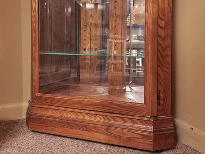 Howard Miller Oak Corner Display Curio Cabinet