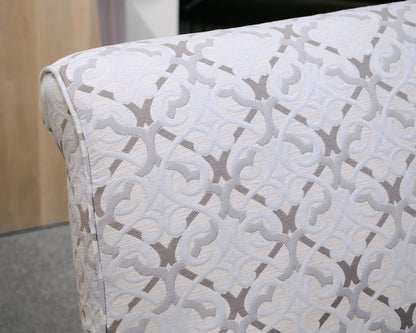 Upholstered Settee with Rolled Arms and Turned Legs