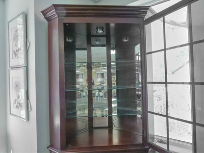 Hitchcock Lighted Corner Cabinet in Cherry