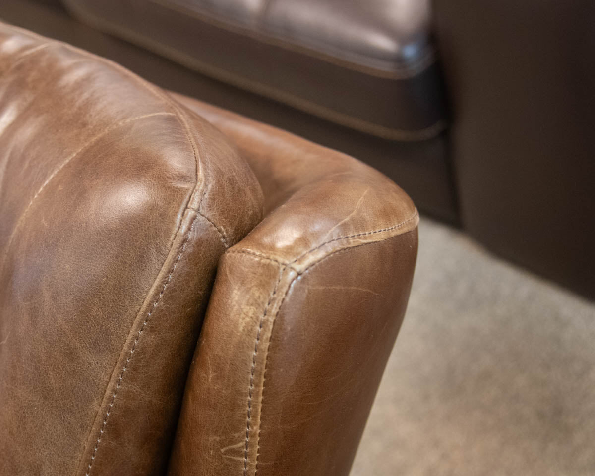 Pottery Barn Wells Tufted Swivel Recliner in Molasses Leather